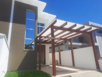 Casa à venda com 143m², 3 quartos, 1 suíte, 2 vagas no bairro Carianos em Florianópolis - Foto 2