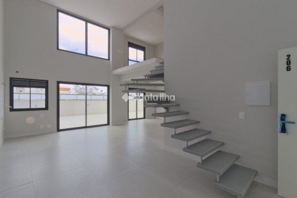 Apartamento à venda com 73m², 2 quartos, 1 suíte, 2 vagas no bairro Coqueiros em Florianópolis
