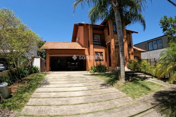 Casa em Condomínio para alugar ou comprar com 230m², 4 quartos, 3 suítes, 4 vagas no bairro Rio Tavares em Florianópolis