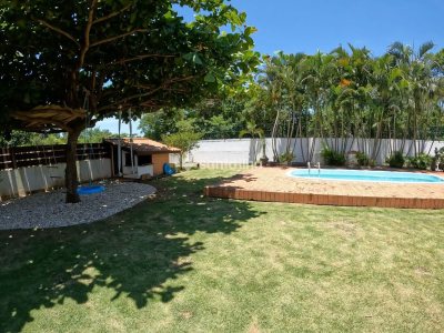 Casa em Condomínio para alugar ou comprar com 230m², 4 quartos, 3 suítes, 4 vagas no bairro Rio Tavares em Florianópolis - Foto 7