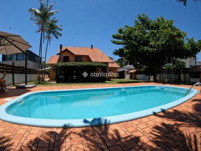 Casa em Condomínio para alugar ou comprar com 230m², 4 quartos, 3 suítes, 4 vagas no bairro Rio Tavares em Florianópolis - Foto 4