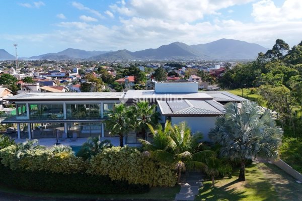 Casa em Condomínio para alugar ou comprar com 1.350m², 6 quartos, 6 suítes, 6 vagas no bairro Campeche em Florianópolis