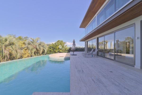 Casa em Condomínio para alugar ou comprar com 1.350m², 6 quartos, 6 suítes, 6 vagas no bairro Campeche em Florianópolis