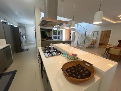 Casa em Condomínio para alugar ou comprar com 417m², 5 quartos, 4 suítes, 2 vagas no bairro Rio Tavares em Florianópolis - Foto 5