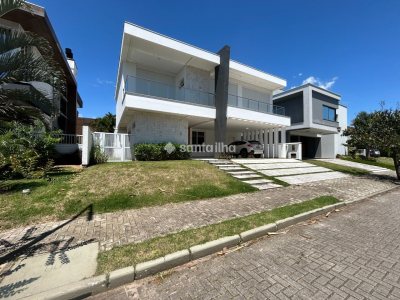 Casa em Condomínio para alugar ou comprar com 417m², 5 quartos, 4 suítes, 2 vagas no bairro Rio Tavares em Florianópolis - Foto 38