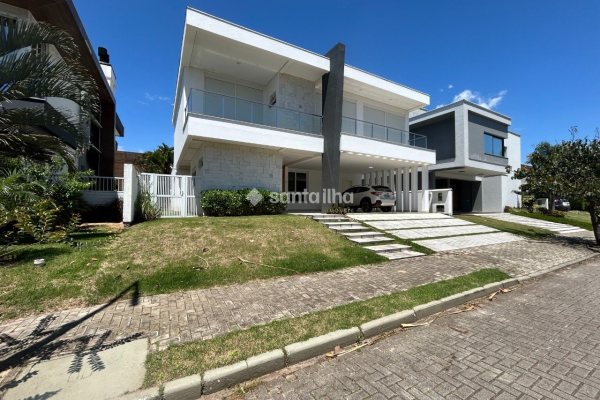 Casa em Condomínio para alugar ou comprar com 417m², 5 quartos, 4 suítes, 2 vagas no bairro Rio Tavares em Florianópolis