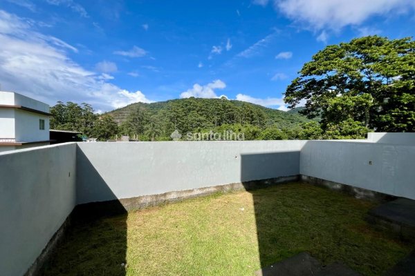 Casa à venda com 112m², 3 quartos, 1 suíte, 2 vagas no bairro Rio Tavares em Florianópolis