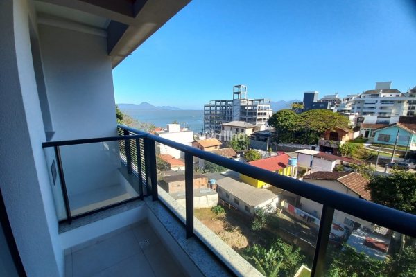 Apartamento à venda com 60m², 2 quartos, 1 suíte, 1 vaga no bairro Coqueiros em Florianópolis