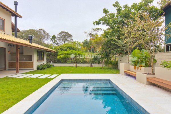 Casa em Condomínio à venda com 350m², 3 quartos, 3 suítes, 2 vagas no bairro Rio Tavares em Florianópolis