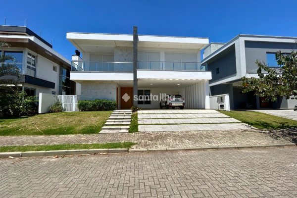 Casa em Condomínio para alugar ou comprar com 417m², 5 quartos, 4 suítes, 2 vagas no bairro Rio Tavares em Florianópolis