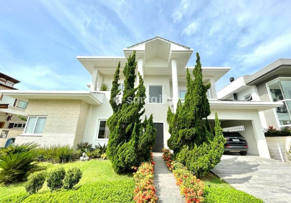 Casa para alugar ou comprar com 358m², 4 quartos, 4 suítes, 3 vagas no bairro Rio Tavares em Florianopolis - Foto 1