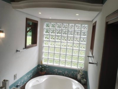 Casa à venda com 263m², 3 quartos, 1 suíte, 4 vagas no bairro Lagoa da Conceição em Florianópolis - Foto 9