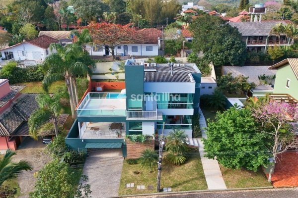 Casa em Condomínio à venda com 280m², 3 quartos, 3 suítes, 2 vagas no bairro Rio Tavares em Florianópolis