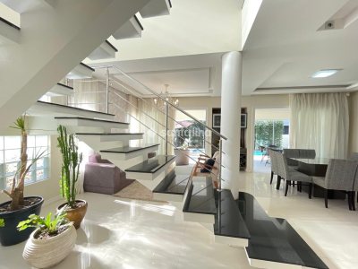 Casa para alugar ou comprar com 358m², 4 quartos, 4 suítes, 3 vagas no bairro Rio Tavares em Florianopolis - Foto 11