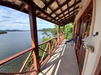 Casa à venda com 320m², 3 quartos, 1 suíte, 3 vagas no bairro Lagoa da Conceição em Florianópolis - Foto 5