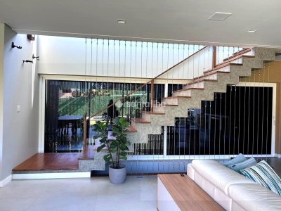 Casa em Condomínio para alugar ou comprar com 431m², 4 quartos, 4 suítes, 4 vagas no bairro Rio Tavares em Florianópolis - Foto 10