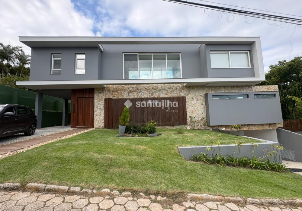 Casa em Condomínio para alugar ou comprar com 431m², 4 quartos, 4 suítes, 4 vagas no bairro Rio Tavares em Florianópolis - Foto 1