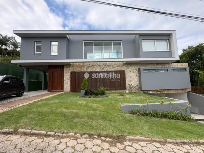 Casa em Condomínio para alugar ou comprar com 431m², 4 quartos, 4 suítes, 4 vagas no bairro Rio Tavares em Florianópolis - Foto 32