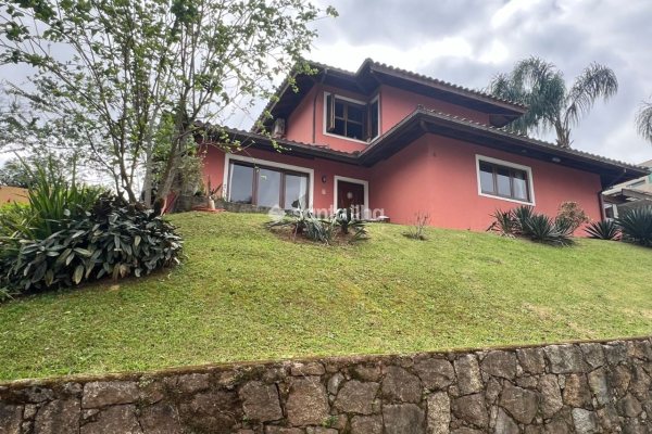 Casa em Condomínio à venda com 199m², 4 quartos, 1 suíte, 2 vagas no bairro Rio Tavares em Florianópolis