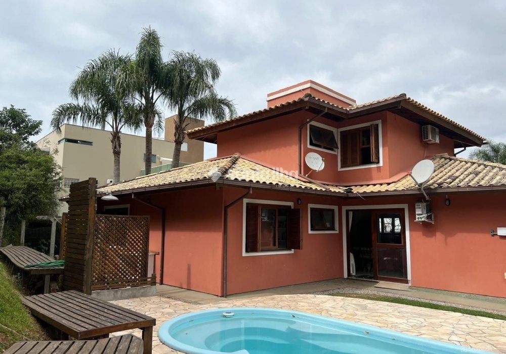 Casa em Condomínio à venda com 199m², 4 quartos, 1 suíte, 2 vagas no bairro Rio Tavares em Florianópolis - Foto 1