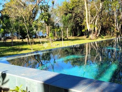 Casa em Condomínio à venda com 341m², 4 quartos, 4 suítes, 2 vagas no bairro Lagoa da Conceição em Florianópolis - Foto 56