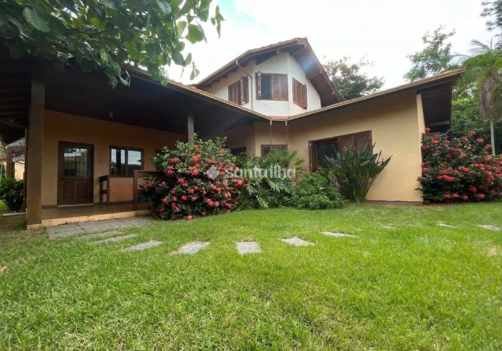 Casa em Condomínio para alugar ou comprar com 320m², 5 quartos, 5 suítes, 4 vagas no bairro Rio Tavares em Florianópolis - Foto 1