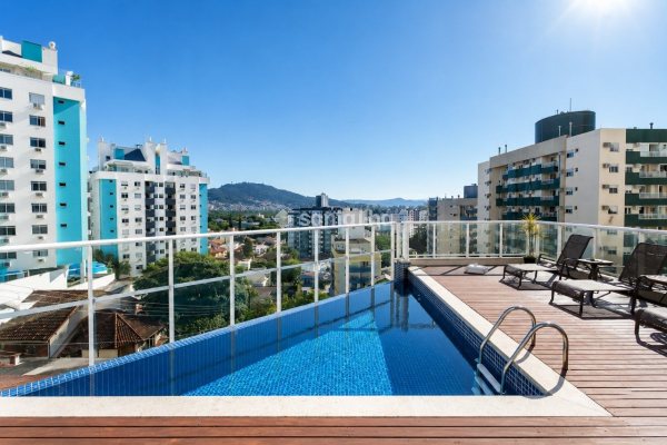 Apartamento à venda com 65m², 2 quartos, 1 suíte, 2 vagas no bairro Itacorubi em Florianópolis