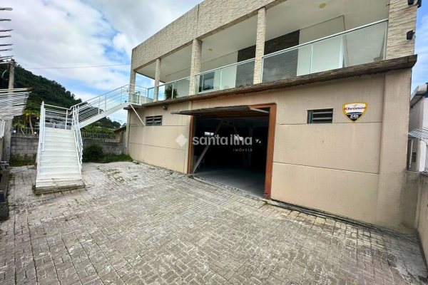 Casa à venda com 350m², 4 quartos, 2 vagas no bairro Rio Tavares em Florianópolis