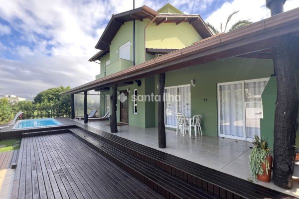 Casa em Condomínio à venda com 214m², 4 quartos, 1 suíte, 4 vagas no bairro Campeche Leste em Florianópolis