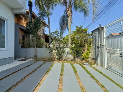 Casa à venda com 100m², 3 quartos, 1 suíte, 2 vagas no bairro Rio Tavares em Florianópolis - Foto 3
