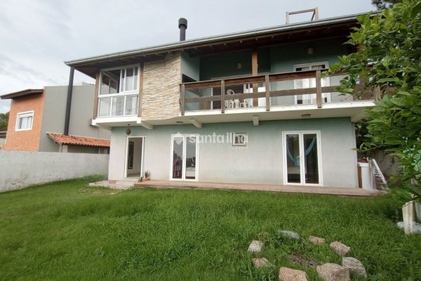 Casa em Condomínio à venda com 200m², 3 quartos, 2 suítes, 3 vagas no bairro Rio Tavares em Florianópolis