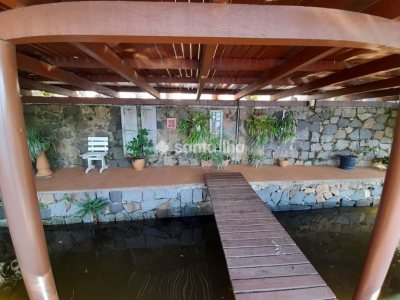 Casa à venda com 320m², 3 quartos, 1 suíte, 3 vagas no bairro Lagoa da Conceição em Florianópolis - Foto 26