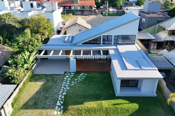 Casa em Condomínio à venda com 281m², 3 quartos, 3 suítes, 6 vagas no bairro Rio Tavares em Florianópolis