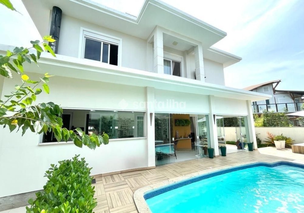 Casa em Condomínio para alugar ou comprar com 358m², 4 quartos, 4 suítes, 3 vagas no bairro Rio Tavares em Florianopolis - Foto 1