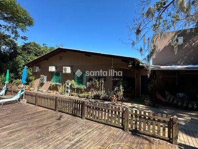 Casa à venda com 220m², 5 quartos, 2 suítes, 4 vagas no bairro Rio Tavares em Florianópolis - Foto 18