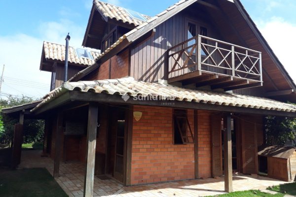 Casa à venda com 154m², 3 quartos, 2 vagas no bairro Rio Tavares em Florianópolis