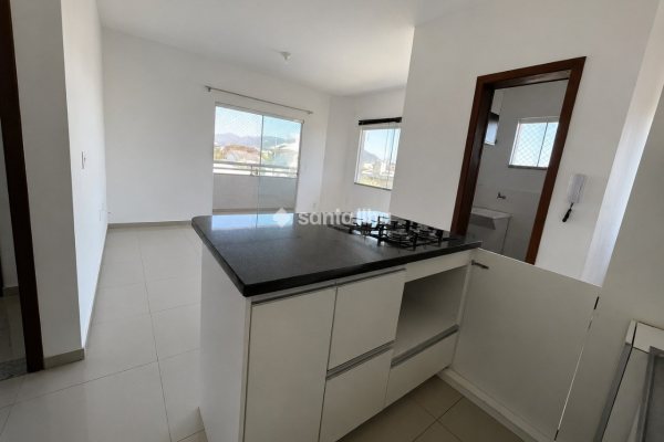 Apartamento à venda com 66m², 2 quartos, 1 suíte, 1 vaga no bairro Carianos em Florianópolis