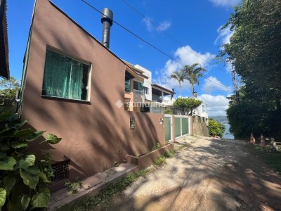 Casa para alugar com 146m², 2 quartos, 1 suíte, 2 vagas no bairro Lagoa da Conceição em Florianópolis - Foto 28