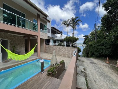 Casa para alugar com 146m², 2 quartos, 1 suíte, 2 vagas no bairro Lagoa da Conceição em Florianópolis - Foto 24