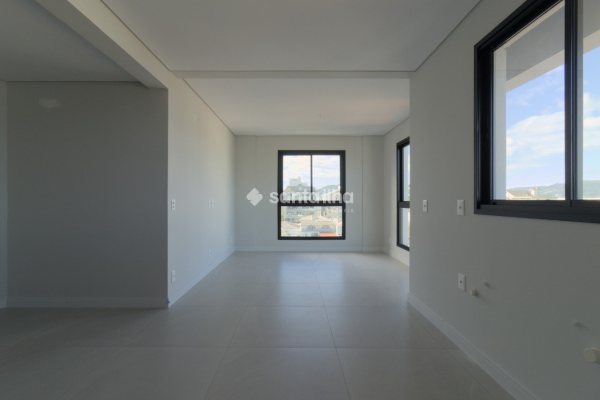 Apartamento à venda com 99m², 3 quartos, 1 suíte, 2 vagas no bairro Coqueiros em Florianópolis