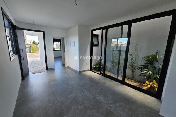 Casa à venda com 162m², 3 quartos, 3 suítes, 2 vagas no bairro Campeche em Florianópolis