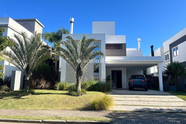 Casa em Condomínio à venda com 340m², 2 quartos, 2 suítes, 4 vagas no bairro Rio Tavares em Florianópolis