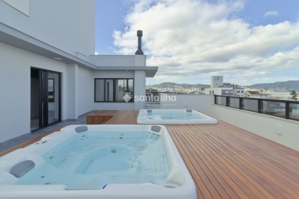 Apartamento à venda com 99m², 3 quartos, 1 suíte, 2 vagas no bairro Coqueiros em Florianópolis