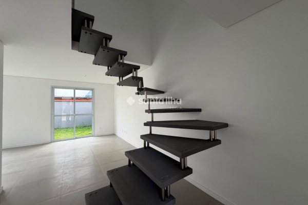 Casa em Condomínio à venda com 102m², 3 quartos, 1 suíte, 2 vagas no bairro Morro das Pedras em Florianópolis